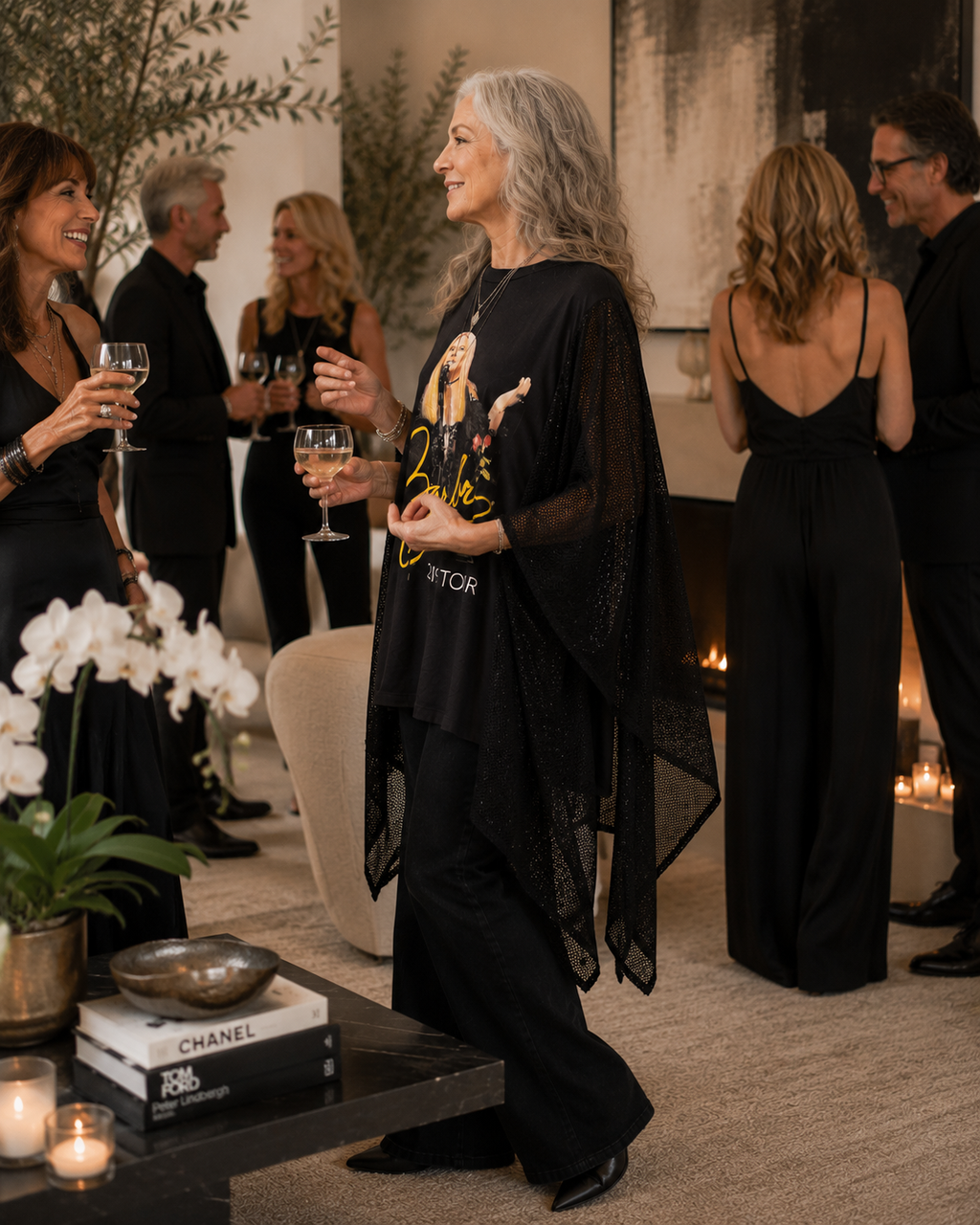Mesh kimono sleeves make this Barbra Streisand concert tee-turned-poncho a truly unique showpiece.