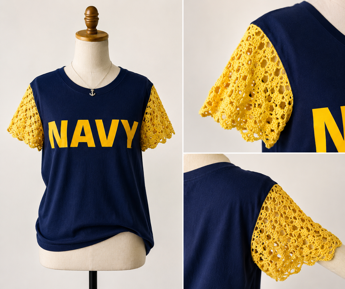 Navy blue NAVY short-sleeve T-shirt reimagined with yellow hand-crocheted cap sleeves.
