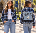 Plaid ruffled Yale Flannel paired with jeans.