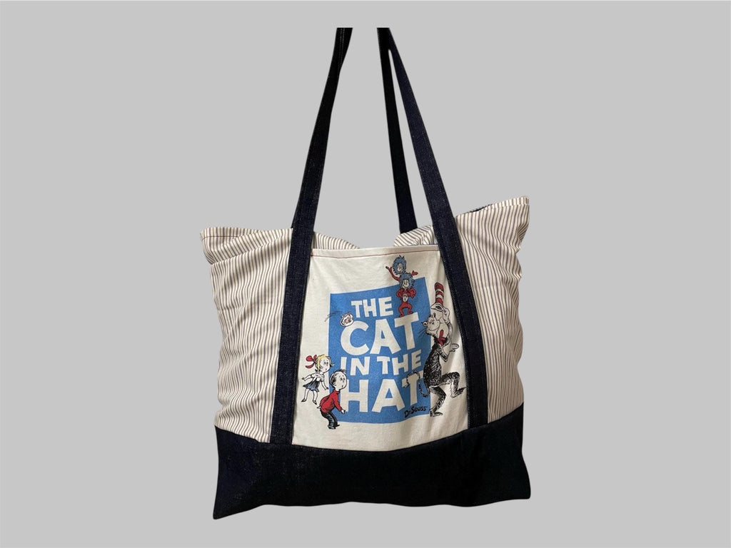 Whimsical meets practical with this large Cat in the Hat tote  (22x22x4 inches).  Reworked, upcycled, sustainable, handmade.