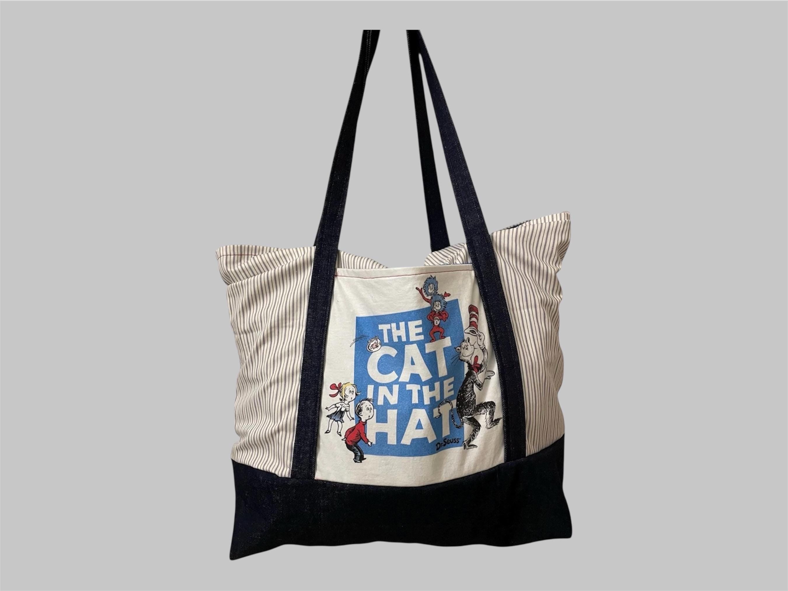 Whimsical meets practical with this large Cat in the Hat tote  (22x22x4 inches).  Reworked, upcycled, sustainable, handmade.