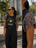 Woman wearing a black tee with U.S. Army graphic and hand-crocheted cap sleeves.