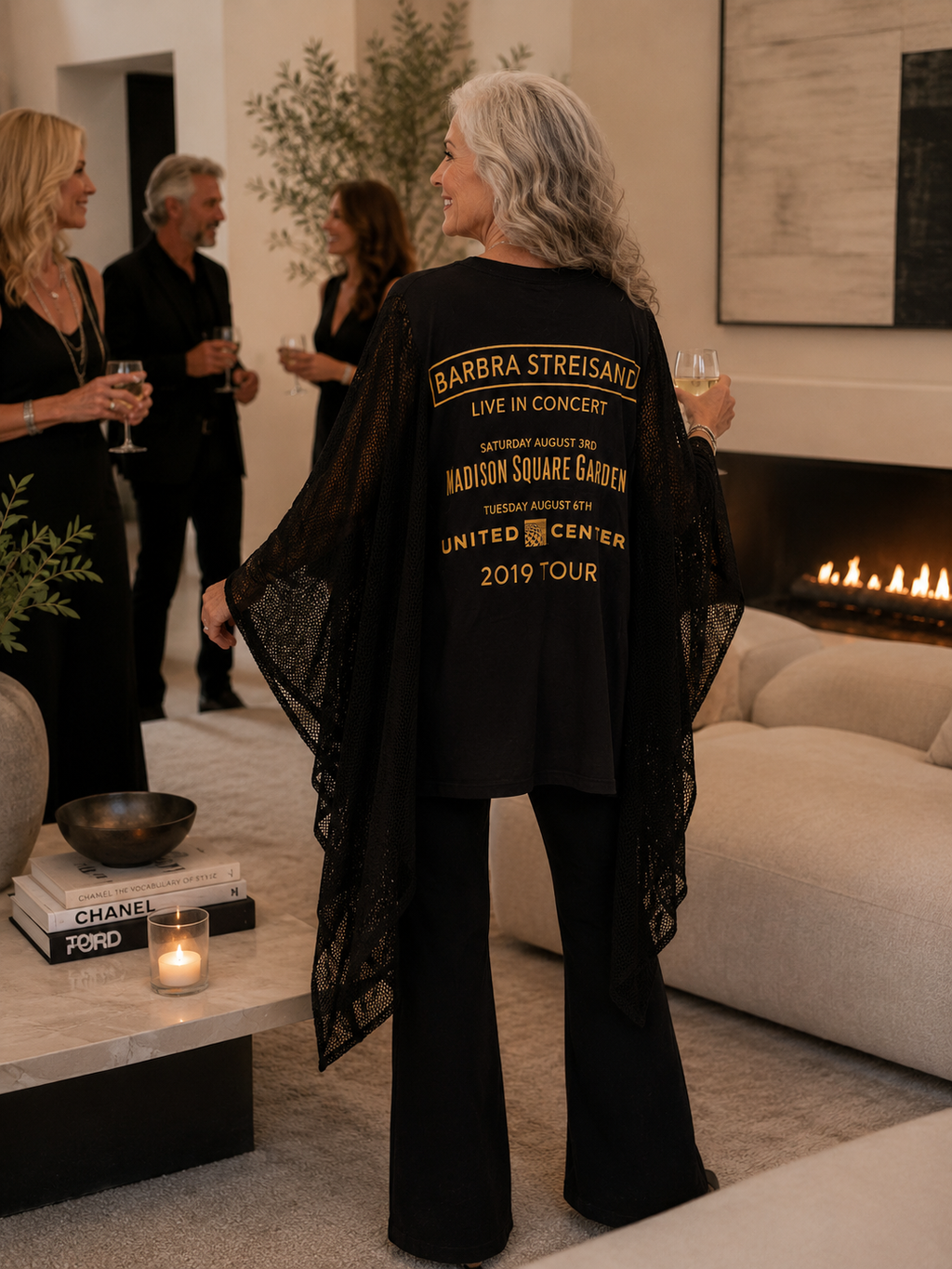 Barbra Streisand 2019 concert tour poncho with mesh kimono sleeves from the back.