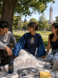 Student wearing Cal Bears tee with flowing batik sleeves.