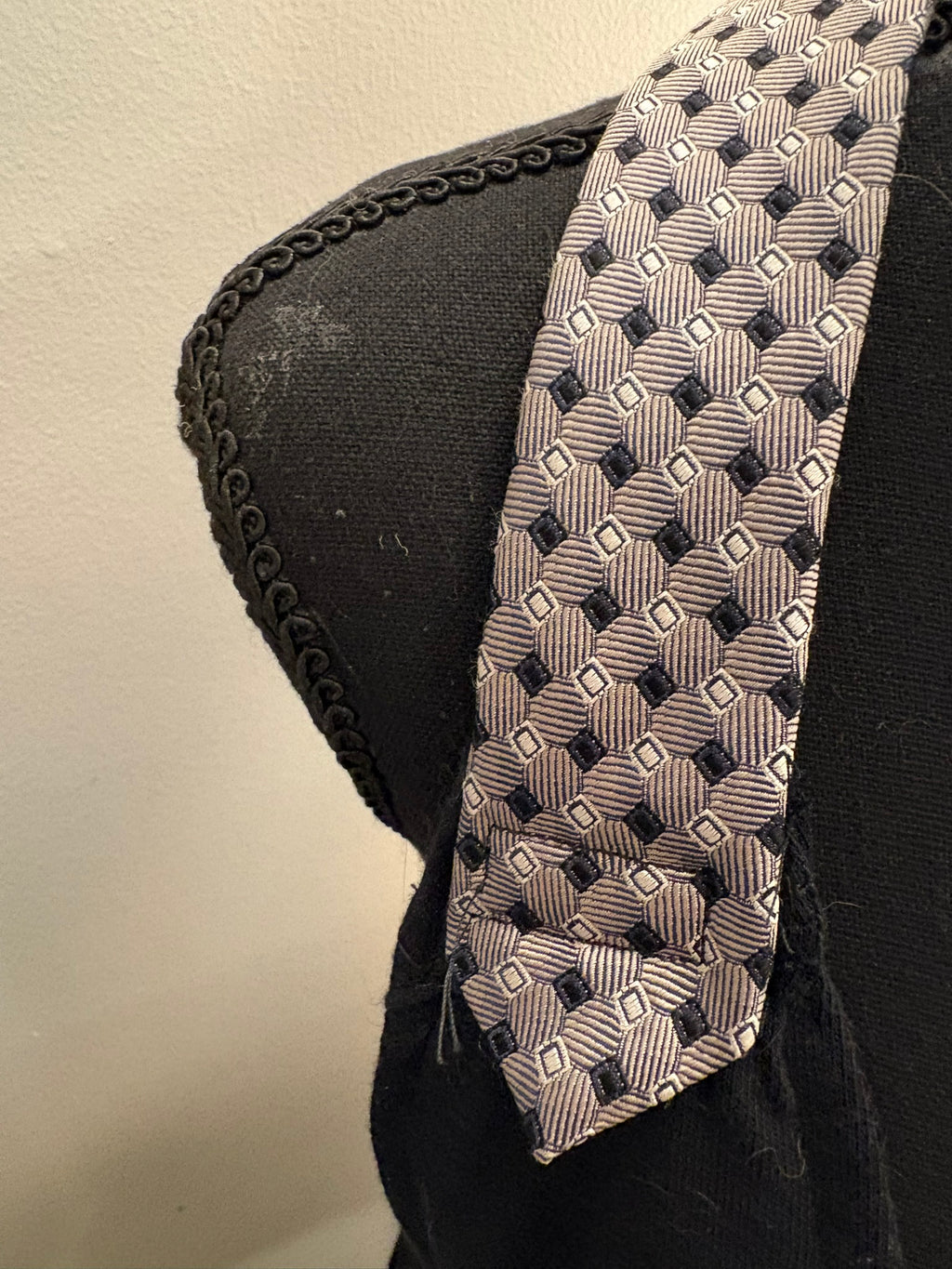 Halter straps made from reclaimed neckties.