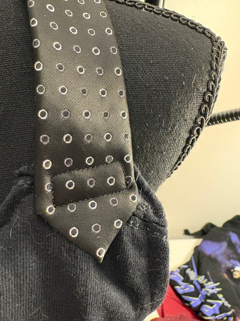 Halter straps made from reclaimed neckties.
