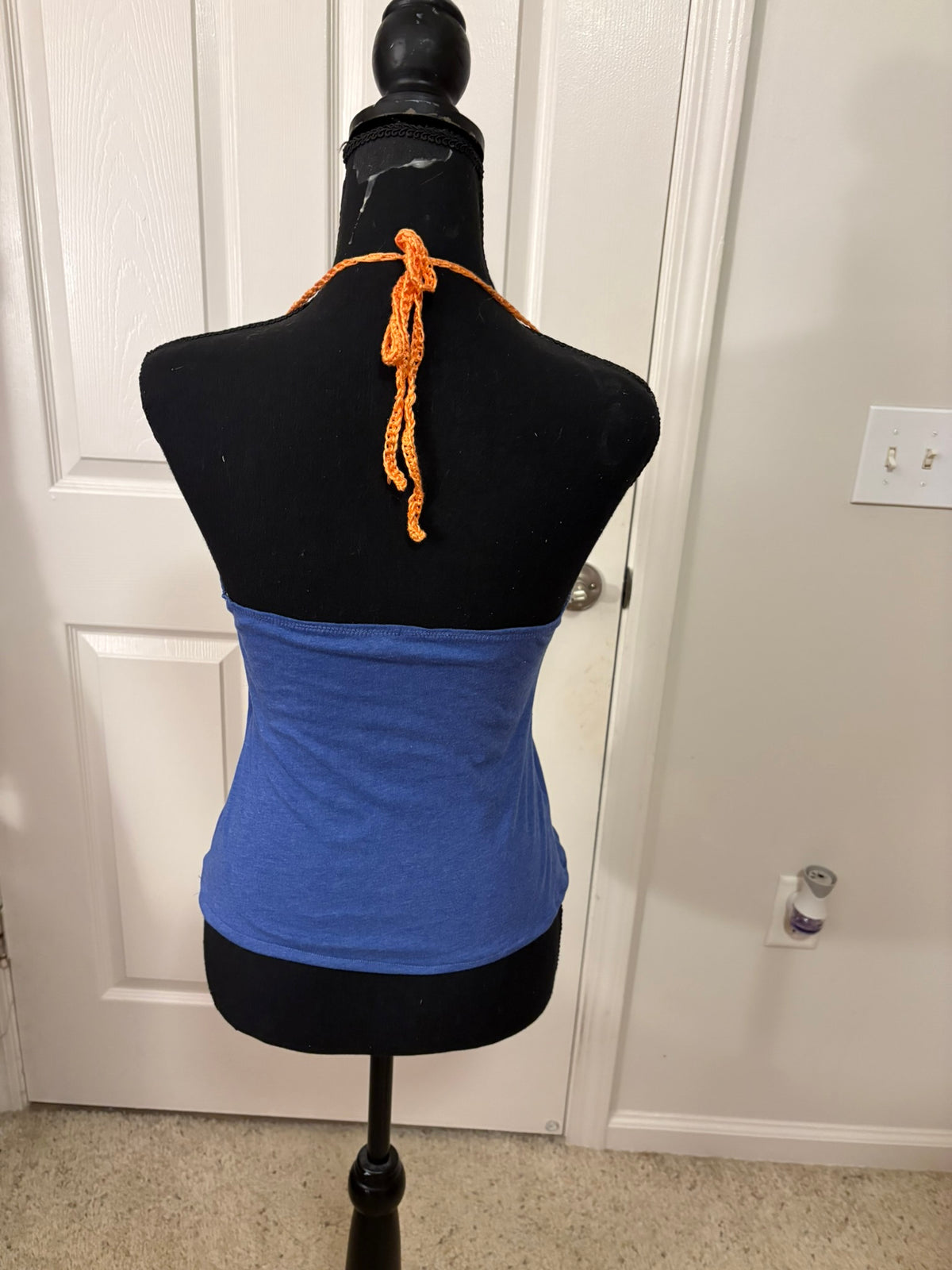 The back of the Florida Gators halter top with orange crocheted tie-neck.