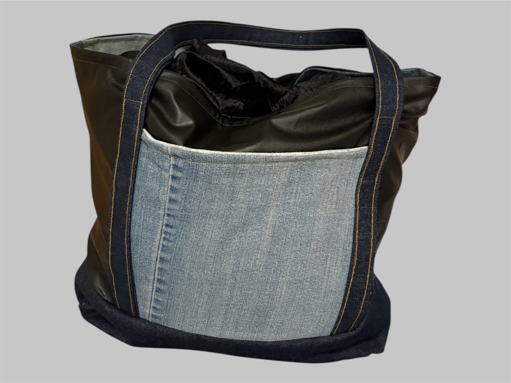 Harley Davidson large tote made with Vegan leather and denim including two interior authentic denim pockets.