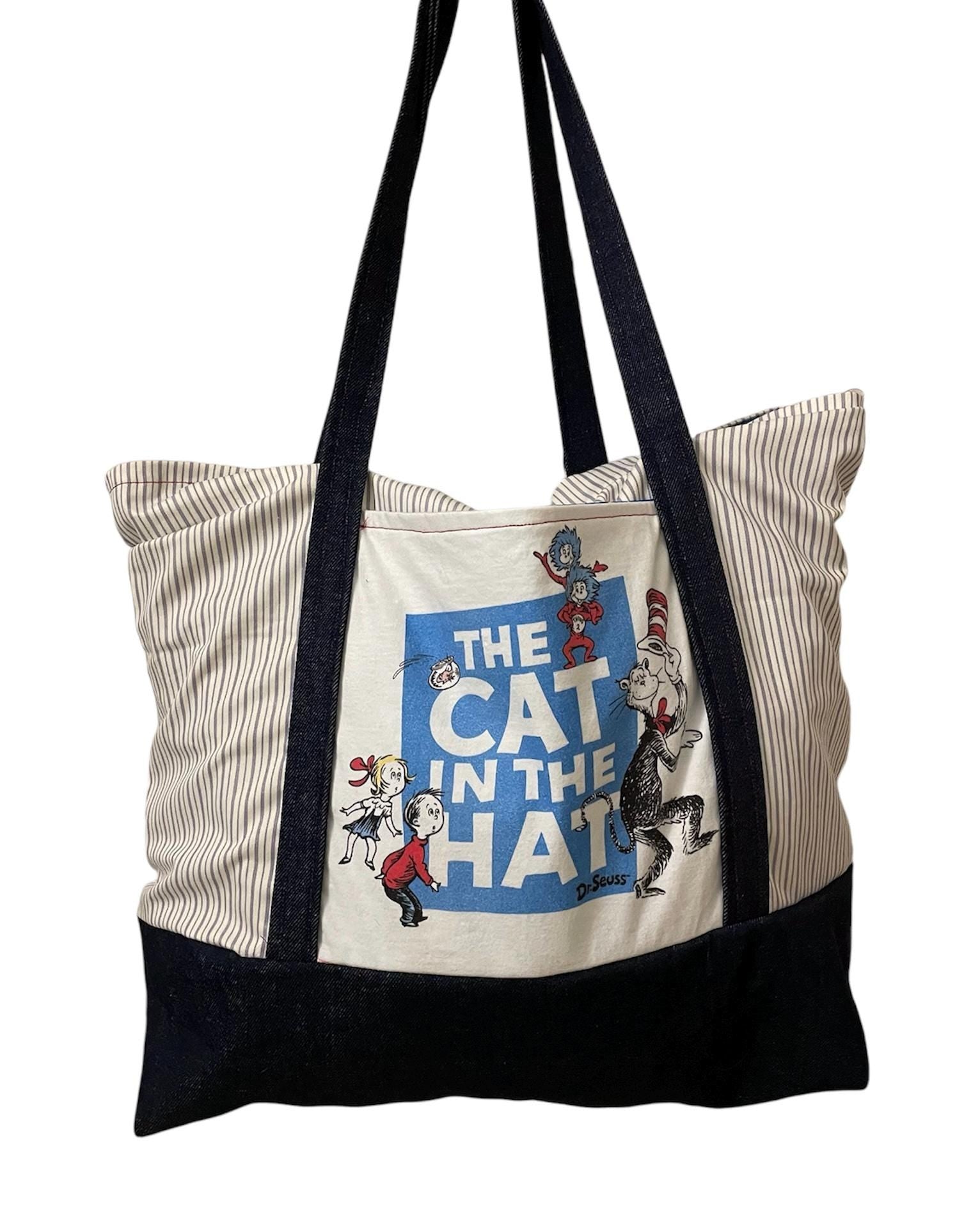 Whimsical meets practical with this large Cat in the Hat tote  (22x22x4 inches).  Reworked, upcycled, sustainable, handmade.