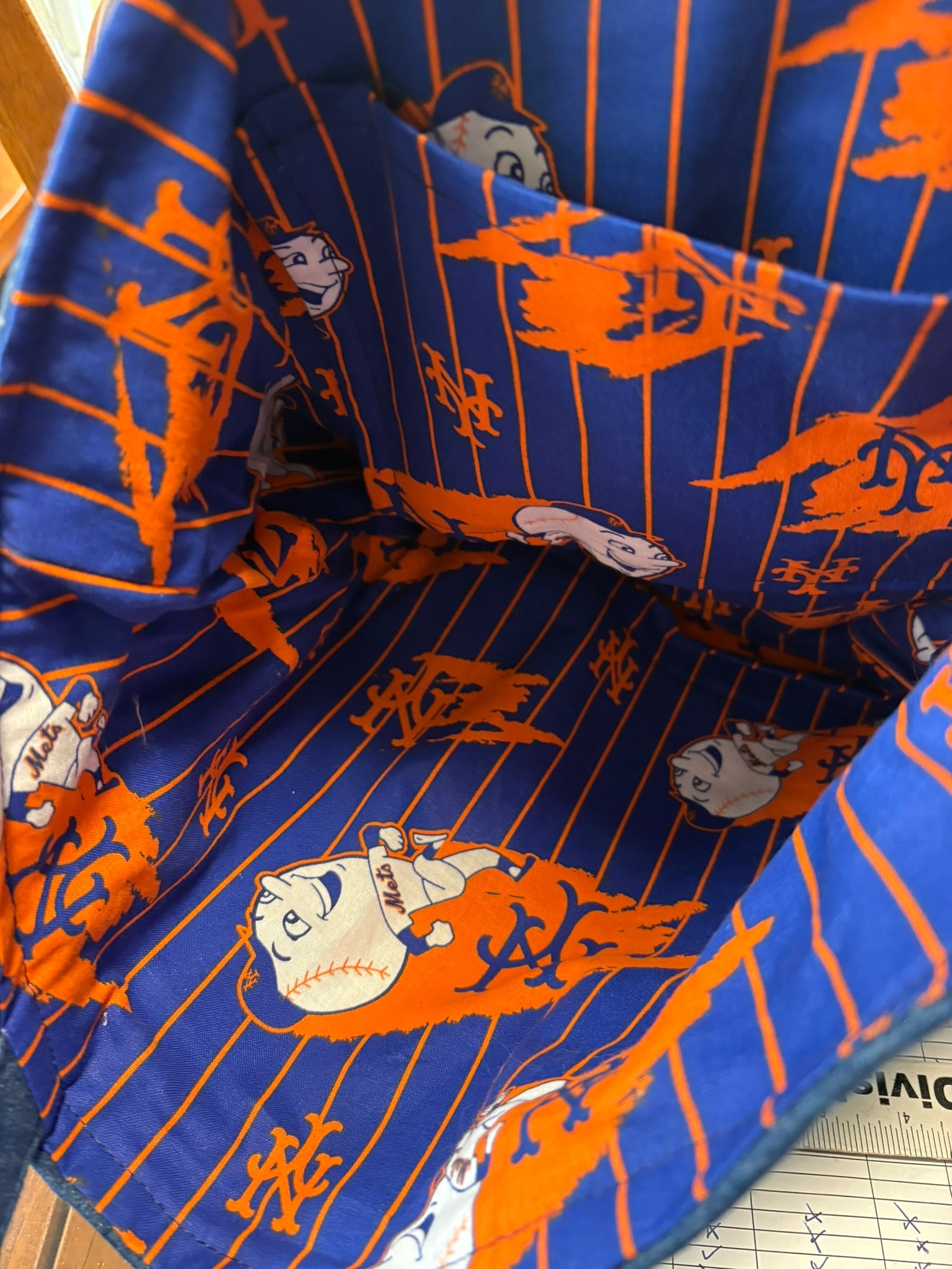 Mets Shoulder Bag interior is lined with Mr. Mets fabric and has one inner pocket.